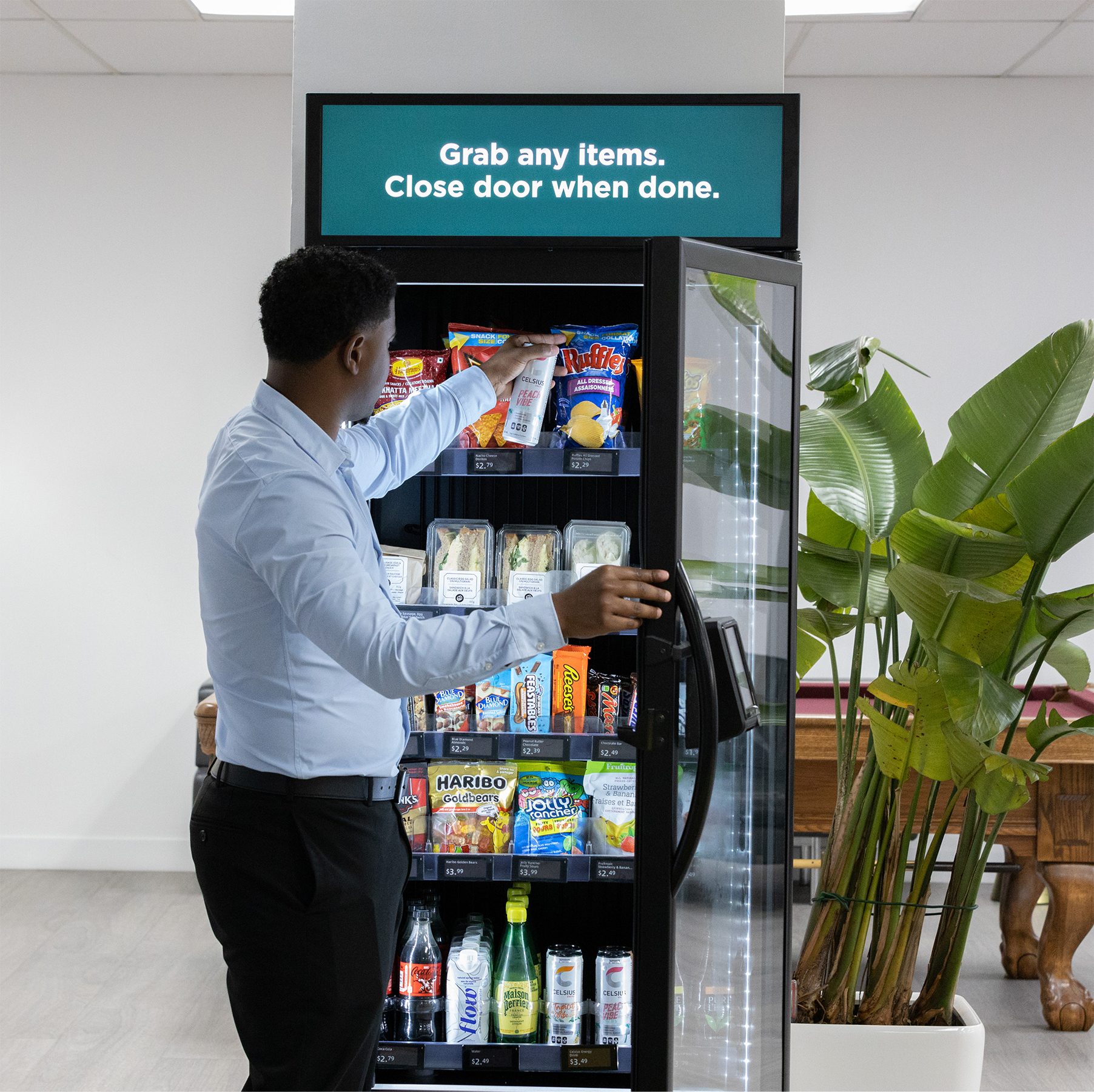 Resident grabbing an item — tap, grab, go